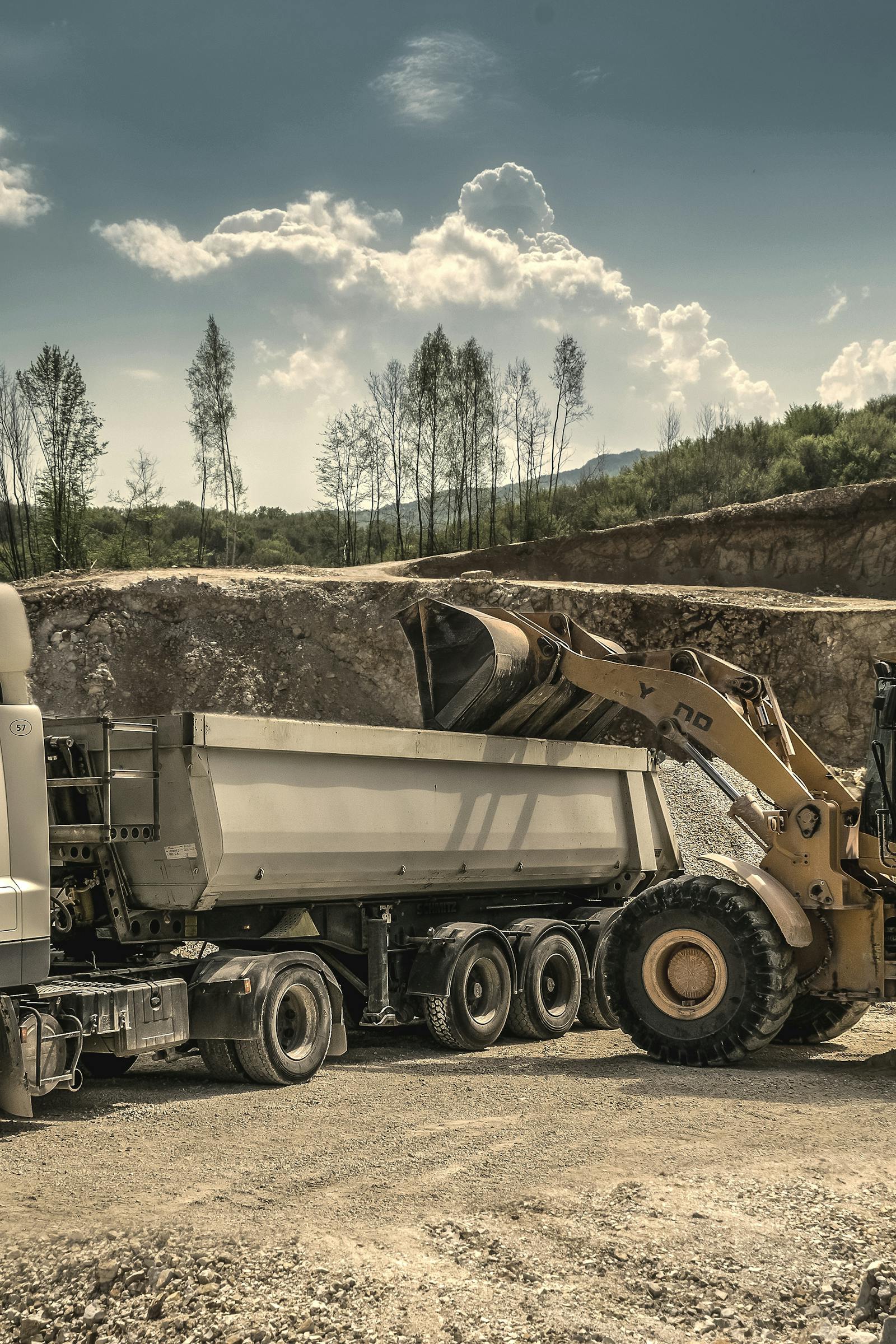 Excavator loading material stock image
